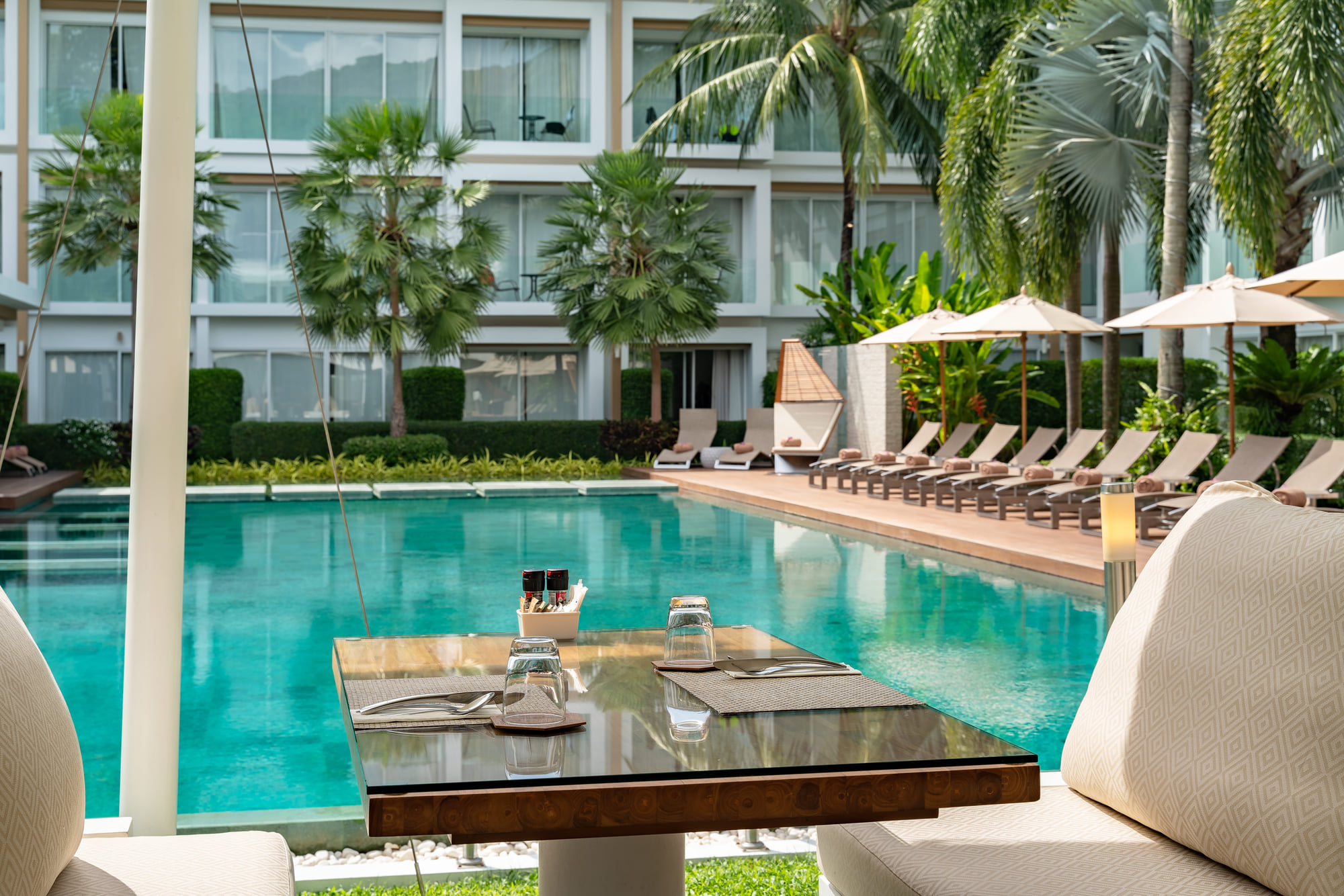 Morning coffee beside the pool at The Alchemy