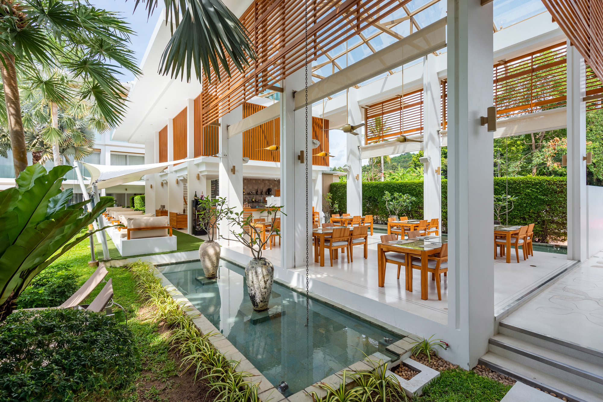 Dining beside the pool at The Alchemy